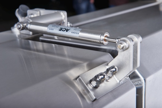Stainless steel industrial gas springs from ACE ensure both power and hygiene when opening and closing protective hoods and maintenance flaps in food processing applications.